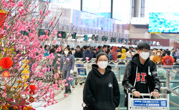 đi máy bay ngày Tết