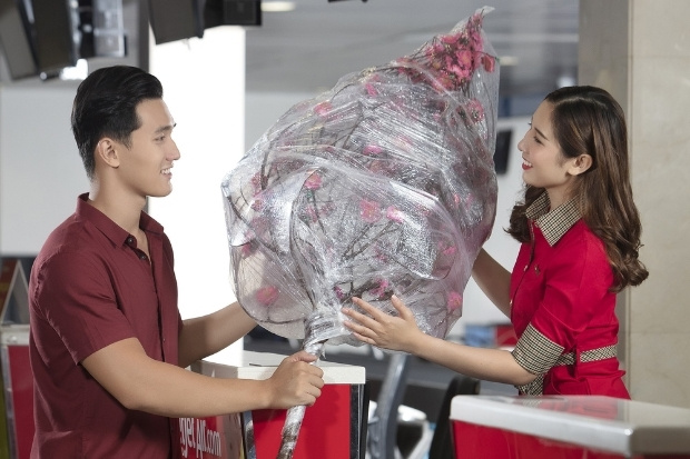 H&atilde;y đến s&acirc;n bay sớm v&agrave; l&agrave;m thủ tục check-in online để tr&aacute;nh &ugrave;n tắc trong dịp Tết